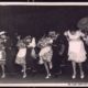 Actuación de parejas bailando danza tradicional. 1966 Se trata de varias parejas representando un baile tradicional, que parece originario de Latinoamérica, por la vestimenta de sus componentes, durante el Certamen Folclórico Hispanoamericano celebrado en Cáceres.