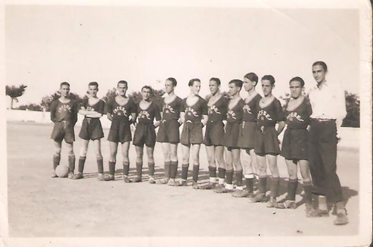Equipo con camiseta de Cáceres