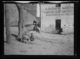 Almacén de maderas en la esquina de La Corredera. Vista parcial de la catedral · Ruth Matilda Anderson, 1928