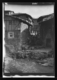 Calle rocosa y casas de mampostería y adobe · Ruth Matilda Anderson, 1928
