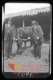 Dos hombres posan con una vaca · Antonio González Martín-Gamero, 1900
