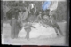 Grupo de vecinos, profesores y sacerdote en el campo, 1920