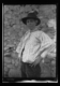 Muchacho con sombrero de fieltro negro adornado con una pluma · Ruth Matilda Anderson, 1928