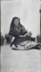 Mujer con traje típico sentada, 1950