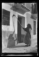 Mujer encalando su casa · Ruth Matilda Anderson, 1928