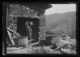 Puerta del molino: el hombre lleva un cesto vacío al hombro · Ruth Matilda Anderson, 1928