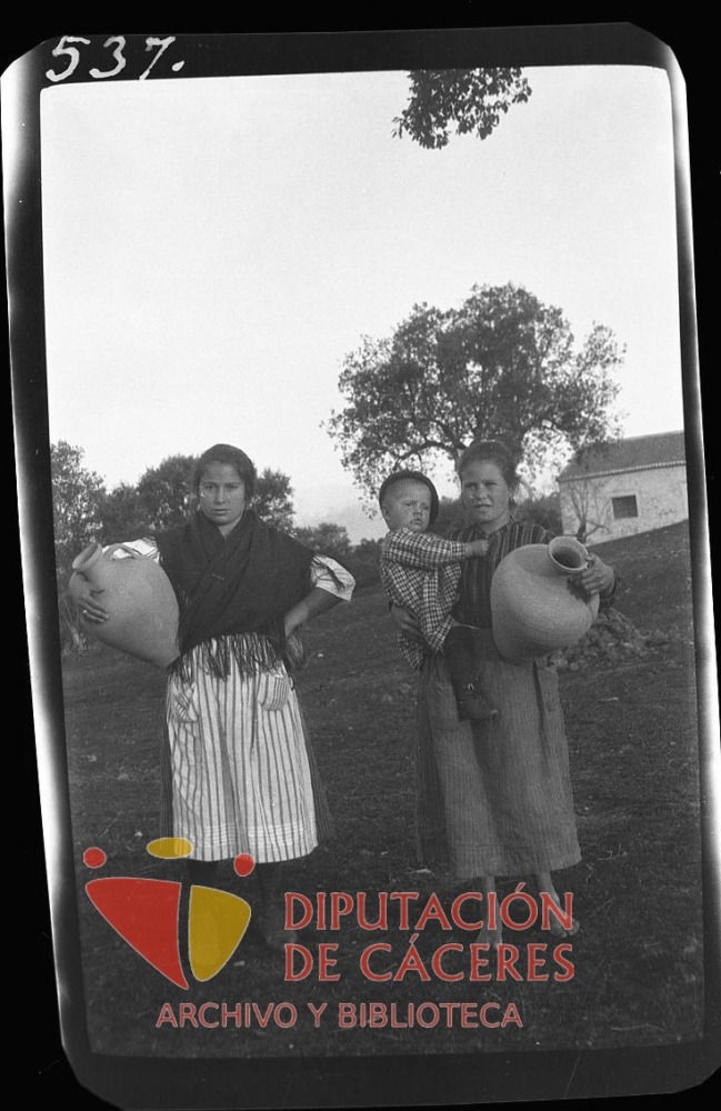 Retrato de dos mujeres y un niño