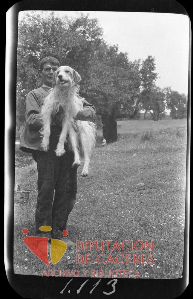 Retrato de un trabajador con un perro