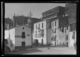 Vista de la catedral y un edificio con un anuncio de Studebaker, en la calle La Corredera · Ruth Matilda Anderson, 1928